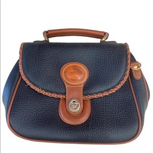 Vintage Dooney & Bourke 
Length: 12 in. Height: 7.5 in. Width: 5.5 in.